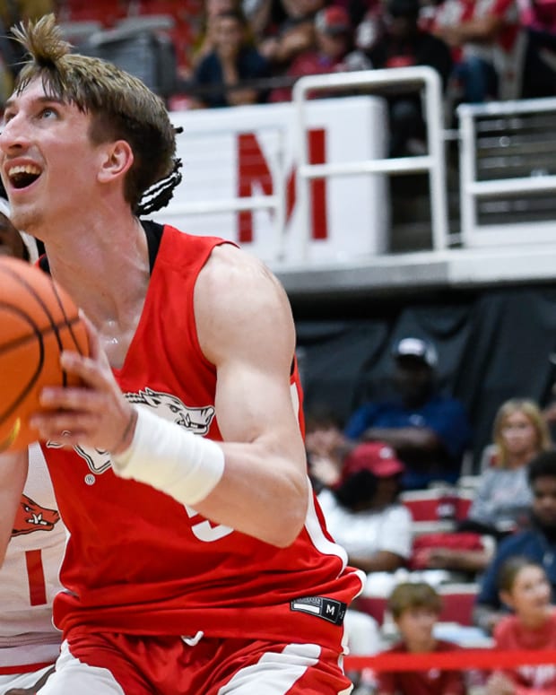 Razorbacks' Joseph Pinion going up for a shot in Red-White game at Barnhill Arena